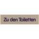 Wortschild ZU DEN TOILETTEN